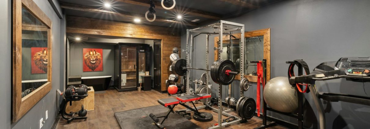home gym addition in a basement remodel - We Finish Basements 2026 Basement Remodel