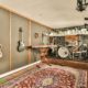 basement music room with guitars on the wall and a drum set - We Finish Basements